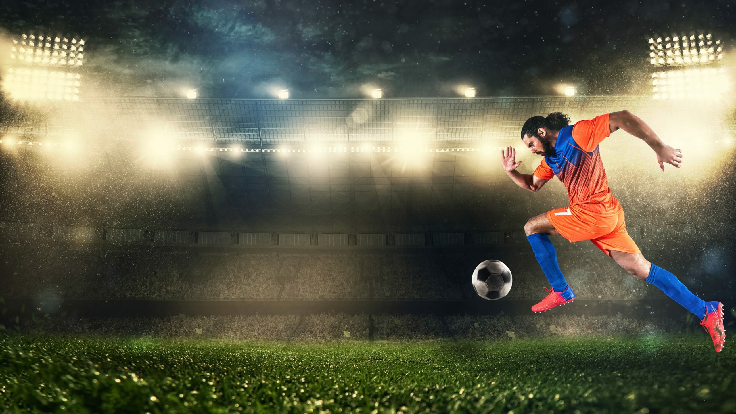 Soccer player in orange and blue